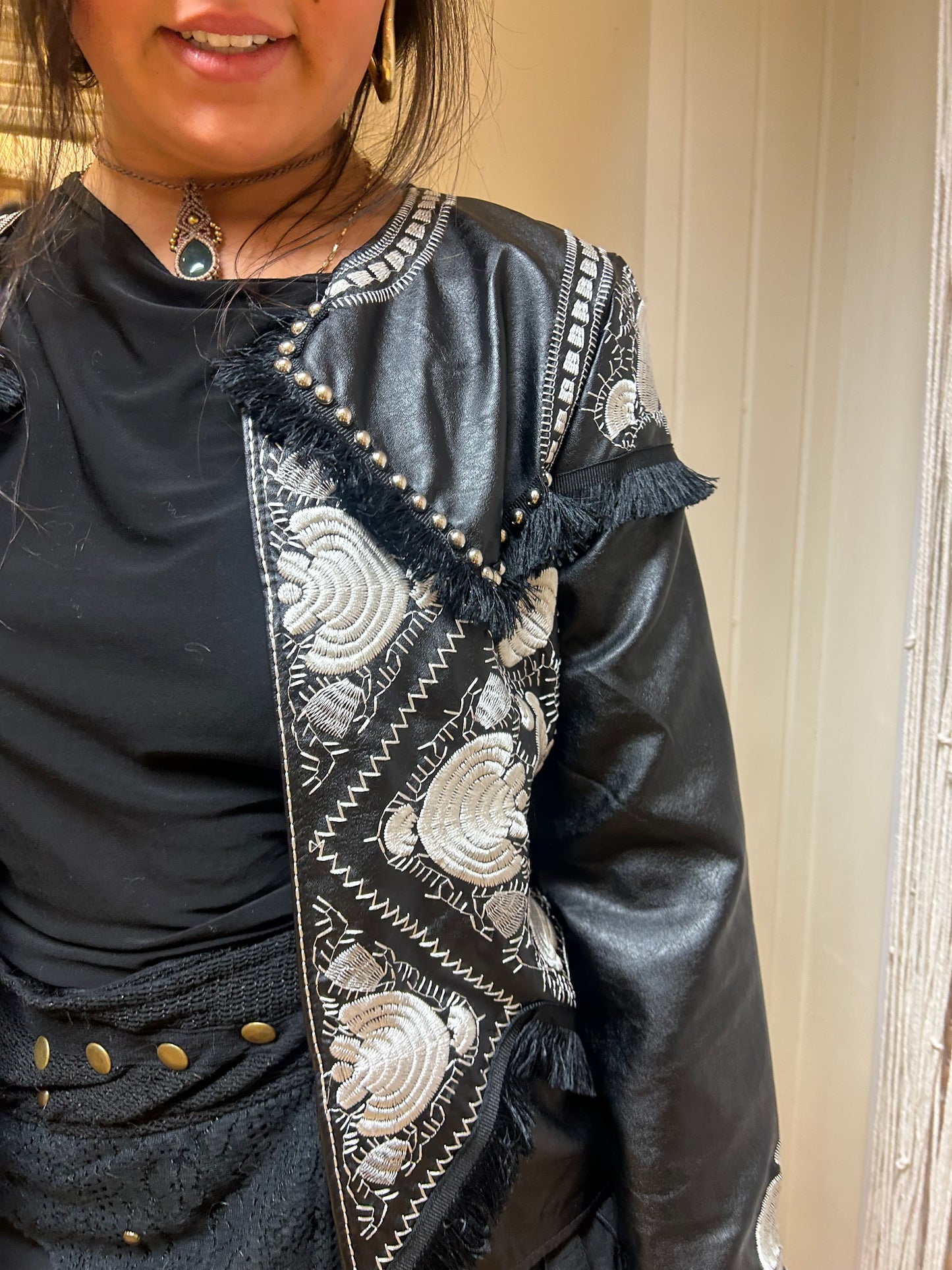 Black embroidered Jacket.